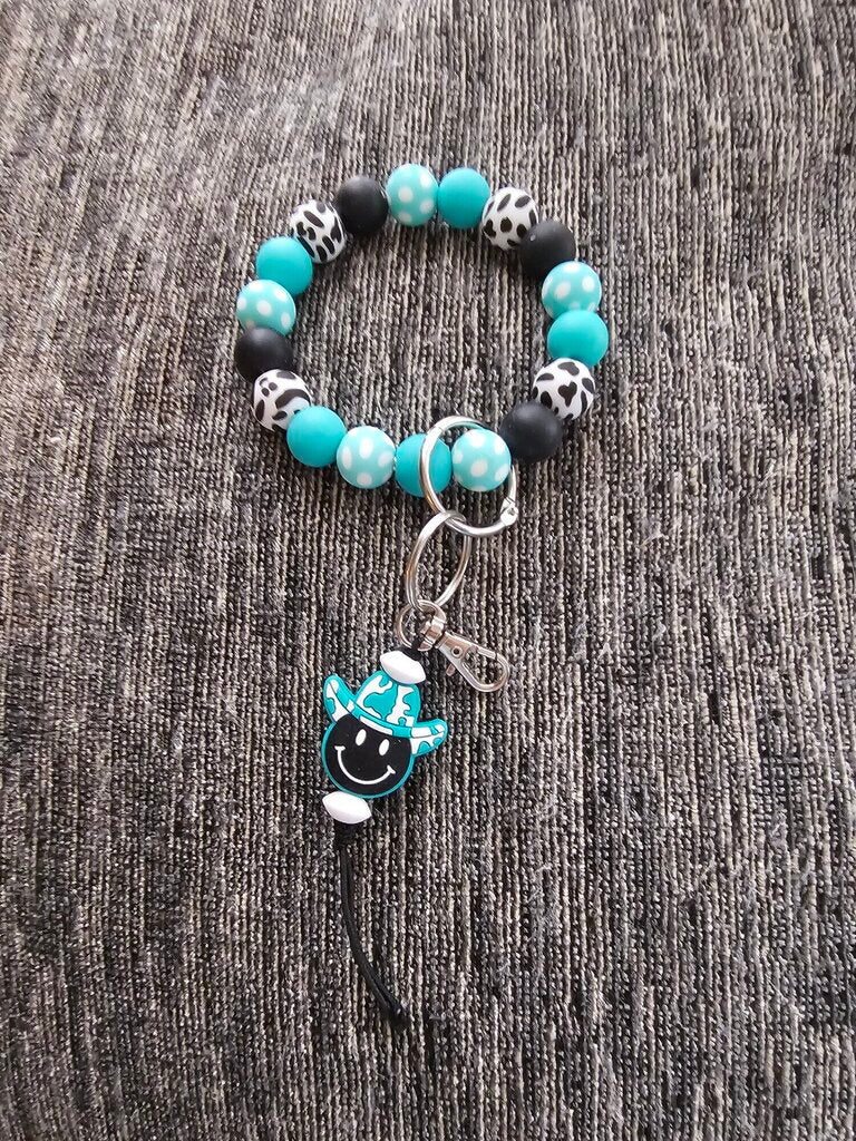 SMILEY COWBOY WRISTLET KE