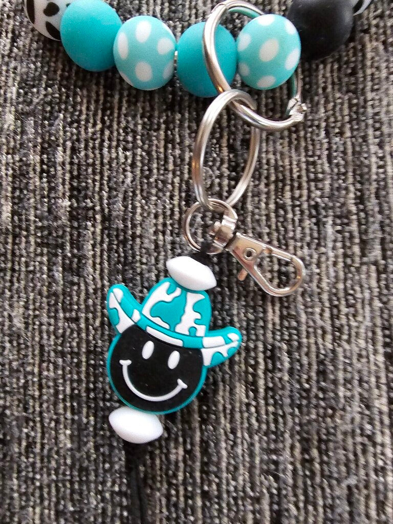 SMILEY COWBOY WRISTLET KE